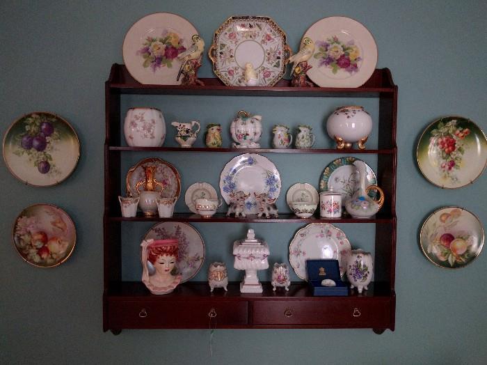 Just like the Biblical Hanging Gardens of Babylon, this mahogany wall shelf is loaded with items just as important.                                                                              Note the set/4 hand-painted plates - they're pretty nice.