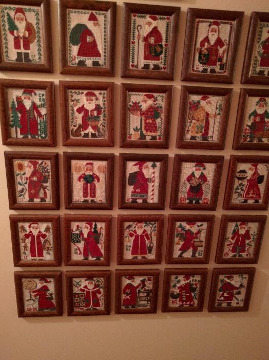An entire wall full of needlepointed Santas - You need one...or two.                                                                       Heck, buy the entire collection and tell everyone you made them. 