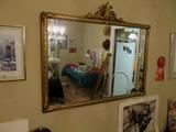 Vintage carved wood gold framed mirror