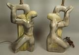 Lot 11:  Pr Von Allesch style ceramic Table lamps. Figural Posing Dancer Forms. Gray & greenish glazed pottery. Opposing left & right images. : Dimensions:  H: 28 inches: W: 9.5 inches: D: 7 inches --- 
