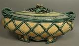 Lot 32:  GAIL KENDALL 2002 American Studio Pottery Lidded Tureen. Green lattice design with 3D applied floral & leaf handle finial. Marked & dated. : Dimensions:  H: 9.5 inches: W: 18 inches: D: 8 inches --- US Shipping charge: $50