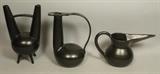 Lot 44:  3pc NEOPONTI by GIO PONTI Black Glazed Vases. One marked. 1) Marked Tall neck pitcher with long bowed handle. Marked. Very Good Condition. 2). Double neck Vessel on 4 feet. Not marked. Small flake chips to feet. Good Condition. 3). Long Spout Low Pitcher. Ball form with long spout. Not marked. Very Good Condition.: Dimensions:  H: 10 inches: W: 8.5 inches: D: 6 inches --- US Shipping charge: $50