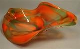 Lot 53:  Large ANN MAYAN 2007 American Art Glass Sculpture. Predominantly Orange Tones. Engraved signature. : Dimensions:  H: 9.25 inches: W: 23.5 inches: D: 16.5 inches --- 