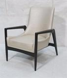 Lot 55:  Ebonized Wood Modernist Frame Lounge Chair. Flared paddle arms. Newly upholstery in silvered cream fabric. : Dimensions:  H: 39 inches: W: 28 inches: D: 32 inches --- 