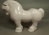 Lot 72:  Large Glazed Pottery Horse Figural Sculpture. Terracotta pottery with mat white glaze. Paper label.: Dimensions:  H: 17.5 inches: W: 24 inches: D: 10 inches --- 
