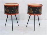 Lot 76:  Pr Italian Toleware Drum Form Side Tables. Ebonized Drumstick Legs. Black toleware drums with gilt eagle & branch design. : Dimensions:  H: 24.5 inches: W: 14.25 inches --- 