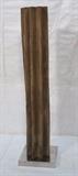 Lot 98:  Antique Shaped Wood Column Sculpture. Chrome Base. Heavy.: Dimensions:  H: 64.25 inches: W: 16 inches: D: 16 inches --- 