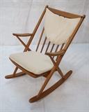 Lot 107:  Frank Reenskaug Modern Rocker Rocking Chair. Tall Spindle Back. Beige fabric seat & back rest cushions. Not marked. Danish Modern: Dimensions:  H: 35.5 inches: W: 26 inches: D: 31 inches --- 
