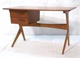 Lot 124:  MILLS Denmark Modernist Desk. Two drawer desk with unique leg details. Stamped mark to bottom.  Nice angled drawers and drawer pulls.: Dimensions:  H: 29.5 inches: W: 47 inches: D: 25 inches --- 