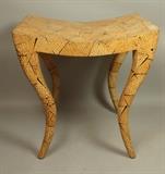 Lot 128:  R&Y AUGOSTI London Lacquered Egg Shell Bench.  Egg shell finish in black lacquer. Bowed top on decorative legs. Metal tag.: Dimensions:  H: 20 inches: W: 20 inches: D: 16 inches --- 