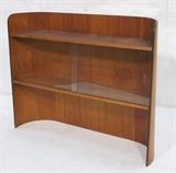 Lot 133:  Rounded Modernist Shelf Unit Bookcase. Sliding Glass Doors. HENRY P GLASS for RICHBILT : Dimensions:  H: 36 inches: W: 48 inches: D: 10 inches --- 