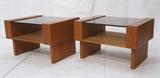 Lot 185:  Pr Danish Teak Modern Glass Top End Side Tables. Smoked Glass Tops above open storage area. : Dimensions:  H: 17 inches: W: 26.75 inches: D: 20.5 inches --- 
