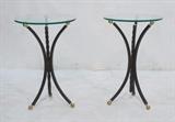 Lot 191:  Pr Iron Glass Top Side Tables. Round glass tops supported on three black iron legs with gold ball caps.: Dimensions:  H: 21.25 inches: W: 14 inches: D: 14 inches --- 
