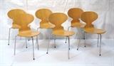 Lot 259:  Set 6 FRITZ HANSEN Ant Chairs. Chrome Legs. Blond Laminated Wood. Labels.: Dimensions:  H: 30 inches: W: 16 inches: D: 16.5 inches --- 