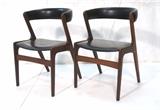 Lot 268:  Pr KAI KRISTIANSEN Danish Dining Chairs. Black Vinyl Seat & Bowed Back Rest. Danish Modern. : Dimensions:  H: 29.5 inches: W: 19.5 inches: D: 19.5 inches --- 