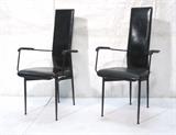 Lot 271:  Pr Black Leather Italian Side Arm Chairs. Black metal drumstick legs. Tall thin backs. Marked Italy. : Dimensions:  H: 41 inches: W: 22 inches: D: 19 inches --- 