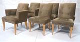 Lot 272:  Set 6 DONGHIA Dining Chairs. Four Sides. Two Arms. Tufted Olive Fabric on light blond wood frames. Labels.: Dimensions:  H: 34 inches: W: 24 inches: D: 23 inches --- 