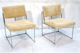 Lot 279:  Pr MILO BAUGHMAN Thin Chrome Frame Dining Chairs. Tan Fabric on thin square tube chrome frame. : Dimensions:  H: 30 inches: W: 20 inches: D: 23 inches --- 