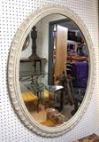 Lot 242:  Oval Hanging Wall Mirror. White Distressed Finish. : Dimensions:  H: 46 inches: W: 35 inches --- 