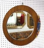 Lot 244:  VETRERIA Modernist Wood Wall Mirror. Enamel Element on round wood frame. Label: Dimensions:  H: 22 inches: W: 22.25 inches --- 
