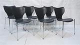 Lot 249:  Set 6 Black & Chrome Side Dining Chairs. AKABA. Stacking. Molded plastic black seats on chrome legs.: Dimensions:  H: 31.5 inches: W: 18.5 inches: D: 18 inches --- 