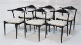 Lot 250:  Set 6 Black Scandinavian Dining Chairs. Curved Bull back with tapered legs. Silver plush fabric.: Dimensions:  H: 28 inches: W: 20.5 inches: D: 18 inches --- 