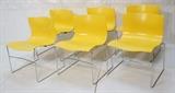 Lot 257:  Set 6 KNOLL by VIGNELLI Yellow Molded Dining Chairs. Molded Yellow Plastic on Chrome Legs. Stacking. Marked.: Dimensions:  H: 29 inches: W: 21 inches: D: 18 inches --- 