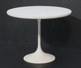 Lot 344:  SAARINEN Style Tulip Side Table. Swollen white base with round white laminate top. : Dimensions:  H: 19 inches: W: 24 inches: D: 24 inches --- 