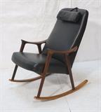 Lot 363:  Black Vinyl Danish Modern Rocker Rocking Chair. Tall Back. Teak wood frame.: Dimensions:  H: 38 inches: W: 24 inches: D: 32 inches --- 