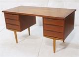 Lot 365:  Two Tone Modernist Desk. One side has large file drawer. Other side has three drawers. Light blond wood legs & base. : Dimensions:  H: 28.5 inches: W: 52 inches: D: 24 inches --- 