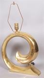 Lot 367:  PIERRE CARDIN Brass Tone Table Lamp. Swoosh. : Dimensions:  H: 23 inches: W: 15 inches --- 