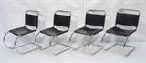 Lot 383:  Set 4 MIES VAN DE ROHE MR Chair Chrome Tubular Lounge Chairs. Black leather seat and backs with corseted detail. : Dimensions:  H: 32 inches: W: 19 inches: D: 26 inches --- 