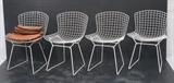 Lot 388:  Set 4 HARRY BERTOIA White Grid form Side Dining Chairs. All white metal frames. Not marked.: Dimensions:  H: 30 inches: W: 31 inches: D: 22 inches --- 