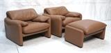 Lot 414:  Pr CASSINA Leather Lounge Chairs & one Ottoman. Modernist Comfort. Slouch form leather seating. Marked. : Dimensions:  H: 27 inches: W: 37 inches: D: 33 inches --- 