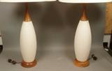 Lot 417:  Pr Tall Walnut Modernist White Textured Pottery Lamps.: Dimensions:  H: 39 inches --- 