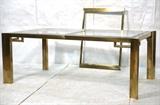 Lot 462:  MASTERCRAFT Dining Table with Architectural Design.  Brass with inset glass.  33.75 inch leaf.: Dimensions:  H: 28.5 inches: W: 46 inches: D: 77.5 inches --- 
