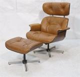 Lot 468:  Eames style Lounge Chair & Ottoman. Brown Leather on Walnut Frame. Not Marked. : Dimensions:  Image Size: H: 40 inches: W: 35 inches: D: 31 inches --- 