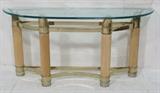 Lot 480:  Glass Brass Designer Hall Console Table. Demi lune glass top. Brass & fluted wood base. legs : Dimensions:  H: 28 inches: W: 56 inches: D: 18.5 inches --- 