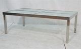 Lot 487:  Italian 70's Chrome Frame Cocktail Coffee Table. Four inset frosted glass panels. : Dimensions:  H: 17.75 inches: W: 53.25 inches: D: 29.5 inches --- 