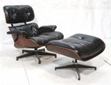 Lot 492:  CHARLES EAMES Rosewood Lounge Chair & Ottoman. Black leather. HERMAN MILLER tag on chair. : Dimensions:  H: 33 inches: W: 34 inches: D: 29 inches --- 