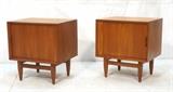 Lot 496:  Pr FALSTER Danish Modern Teak Nite Stands. Tambour Doors. One interior drawer. Raised on legs. Marked with metal tag: Dimensions:  H: 24 inches: W: 21.75 inches: D: 17.5 inches --- 