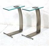 Lot 510:  Pr DIA Brushed Silver Metal Glass Top Side Tables. DESIGN INSTITUTE of AMERICA. : Dimensions:  H: 22.5 inches: W: 16 inches: D: 8 inches --- 