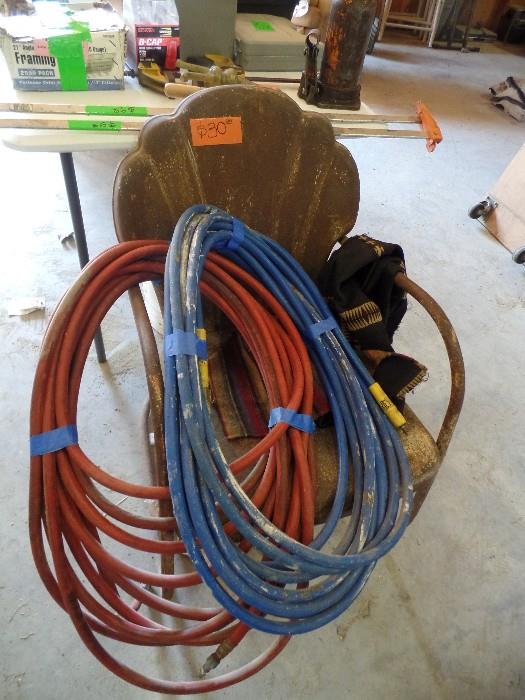 Air Hoses and Metal Lawn Chair. 