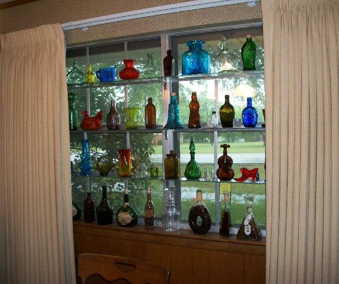 Lots of hand blown glass, Amberina, Fenton, Ardco, Wheaton, Blenko etc.  Plus a large collection of Antique Bottles Soda and many more.