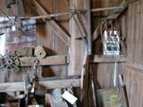 wood cradle head, old hunting posters, long fishing sprar pump