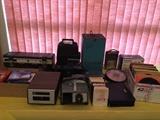 8 tracks, 45s. slide projector, 8 track player, Kodack electric 8 projector , keystone zoom 2500, realist 400 slide, Radiant deluxe meteor screen 