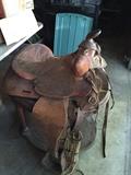 One of three hand tooled saddles