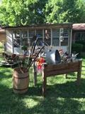 Lots of garden items, the planter table is not for sale, sorry!