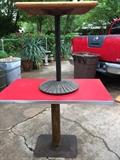 Vintage red top pub table with heavy metal base from a dive bar in Dallas!!  and the smaller table is also vintage with a heavy round metal base.