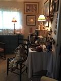 This is another view of the bedroom, duck decoys, prints, chairs, glass, pottery, lamps and lots more